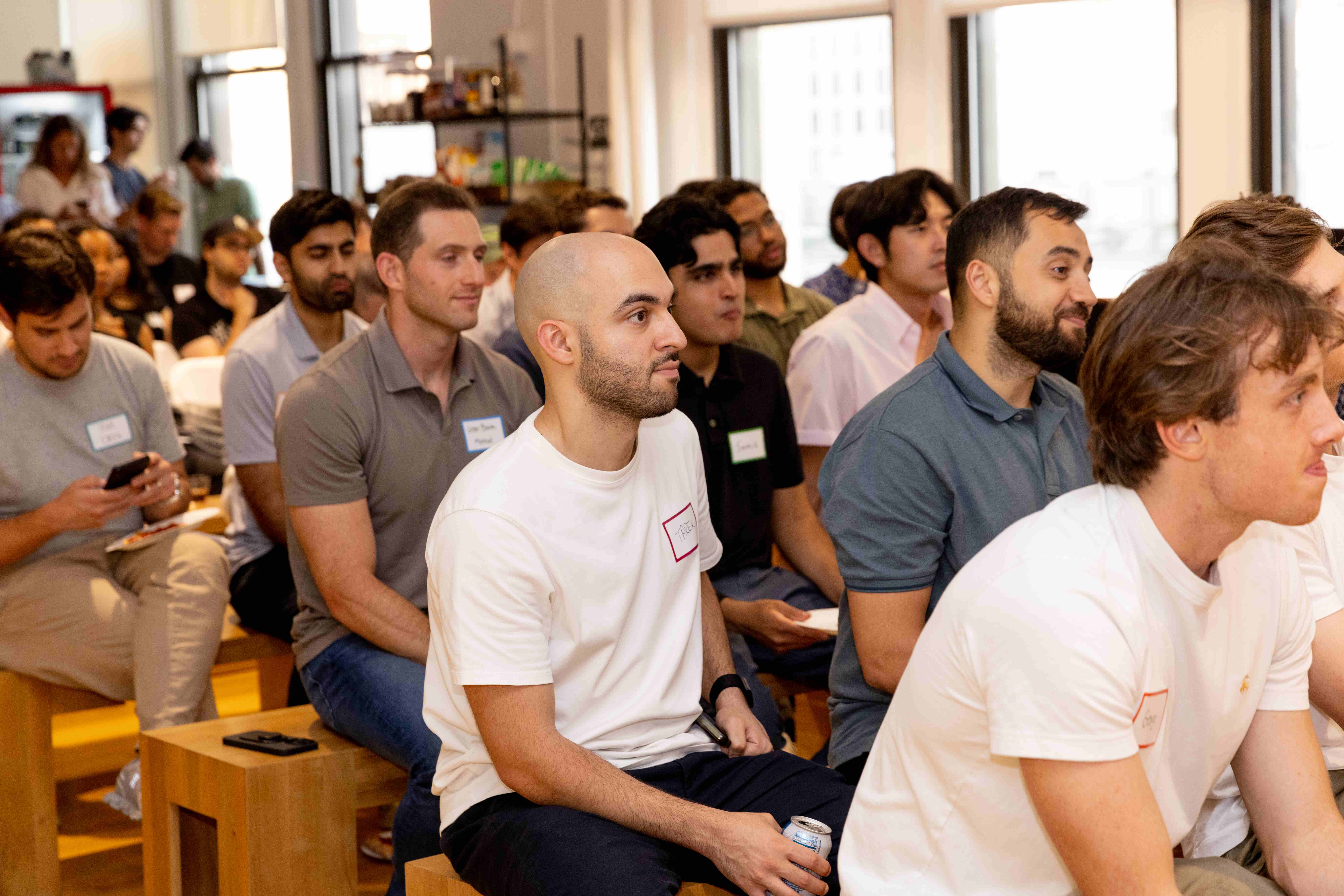 Professional audience listening to presentations at NYC event